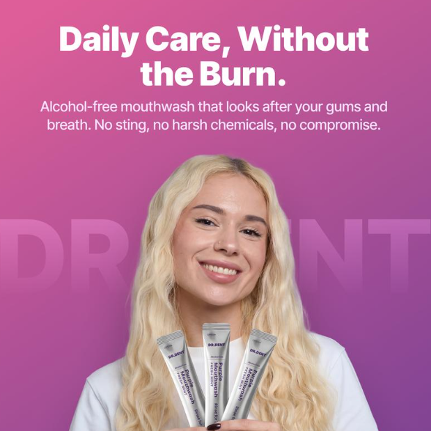 A smiling blonde woman holds four tubes of mouthwash against a pink-to-purple gradient background with the text 'Daily Care, Without the Burn.' and descriptive copy above her.