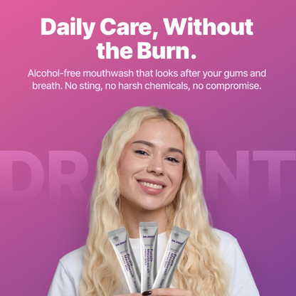 A smiling blonde woman holds four tubes of mouthwash against a pink-to-purple gradient background with the text 'Daily Care, Without the Burn.' and descriptive copy above her.